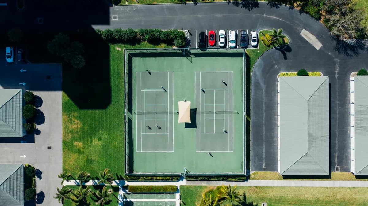 Tennis and pickleball courts with net and court markings